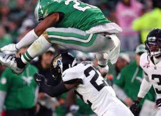 NFL-Star Saquon Barkley springt Spieler rückwärts im American Football – Beeindruckende Aktion! news-04112024-173032